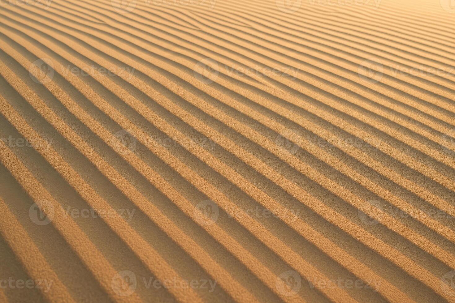 Detailed view of golden desert sand with natural wind blown ripple patterns photo