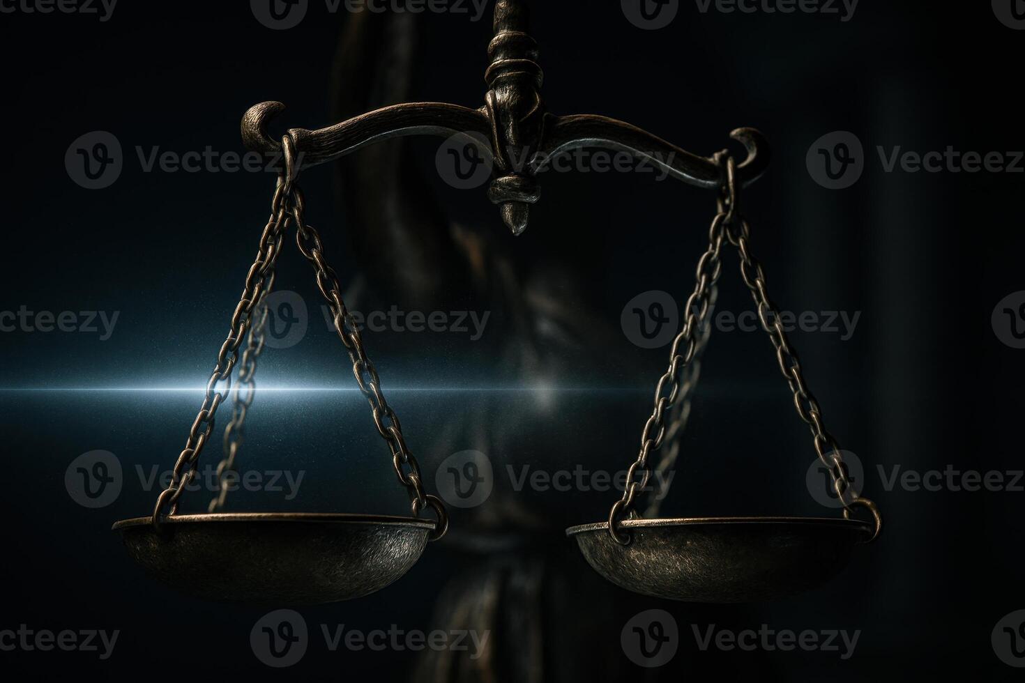 Symbolic scales of justice perfectly balanced with bright light beam photo