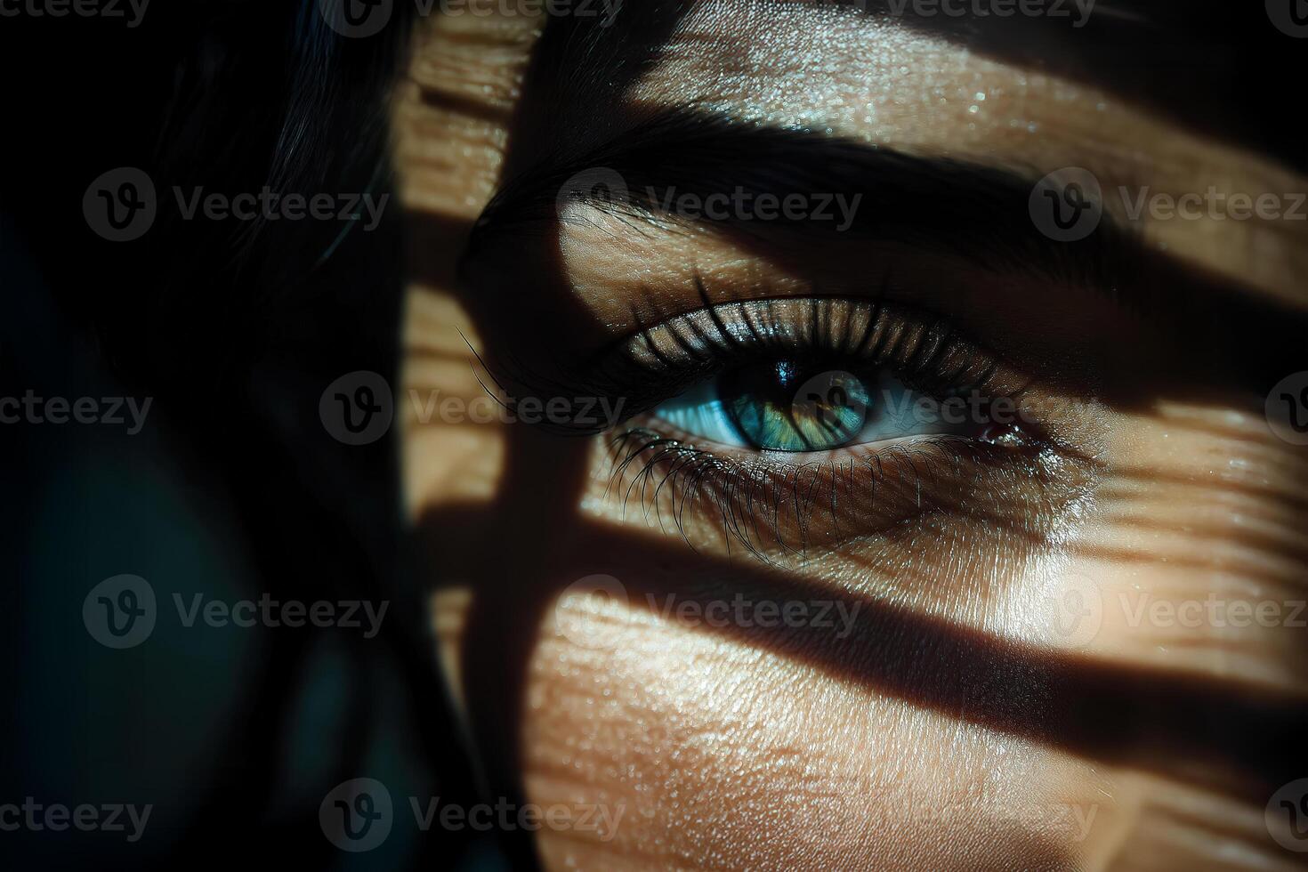 Woman with green eye and projected shadows photo