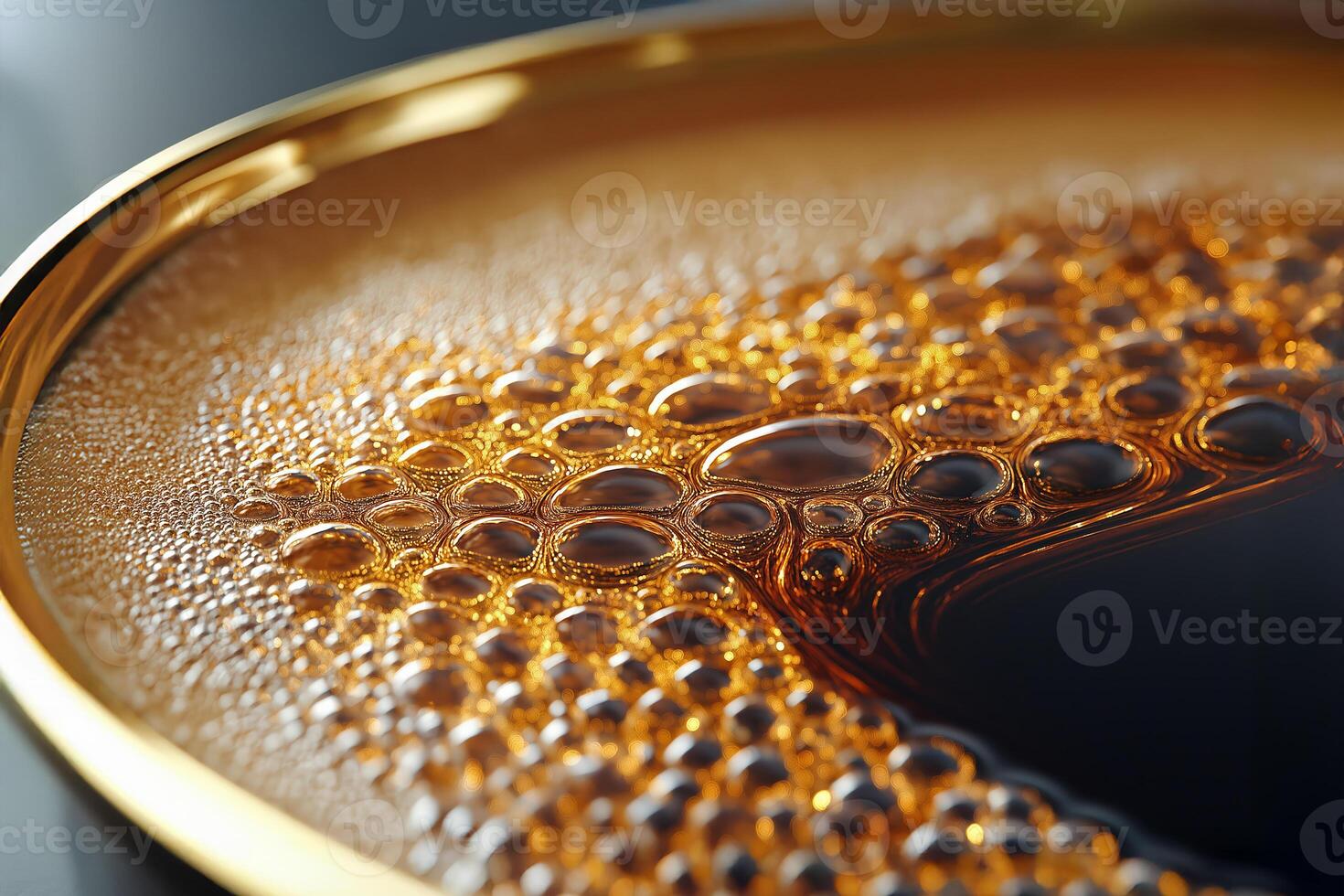 Close-up of golden coffee foam bubbles creating intricate patterns in a luxurious cup photo