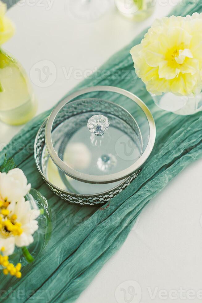 An Elegant Table Setting that incorporates Beautiful Decorative Elements, including Stunning Flowers, perfect for Special Occasions, ensuring a memorable and luxurious dining experience photo