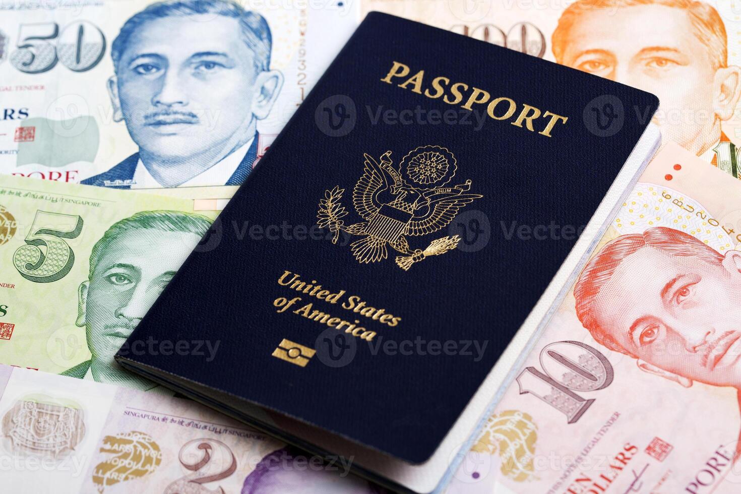 American passport on Singapore dollar photo