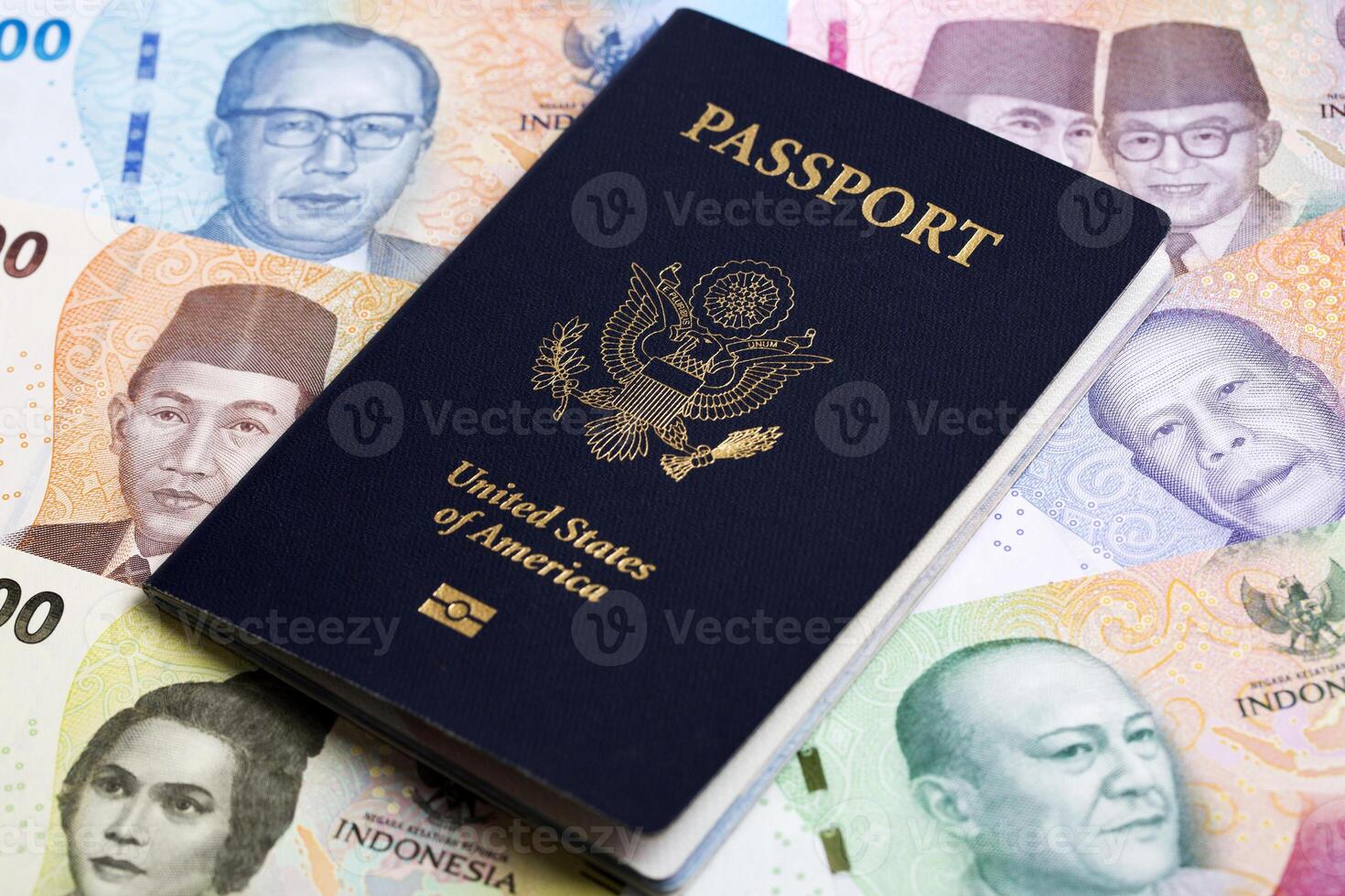 American passport on Indonesian rupiah photo