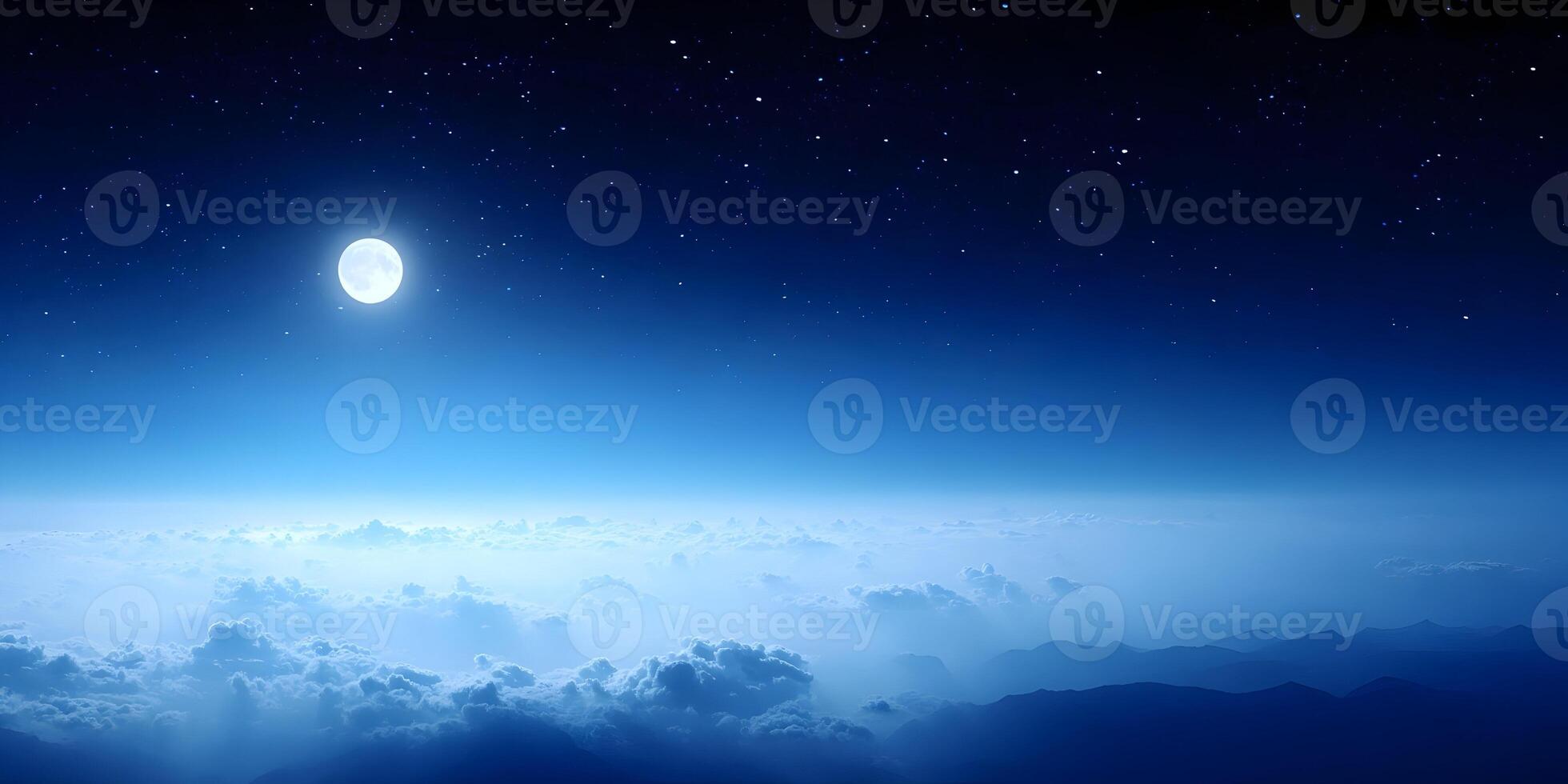 Full Moon Night Sky Above Mountains and Clouds photo