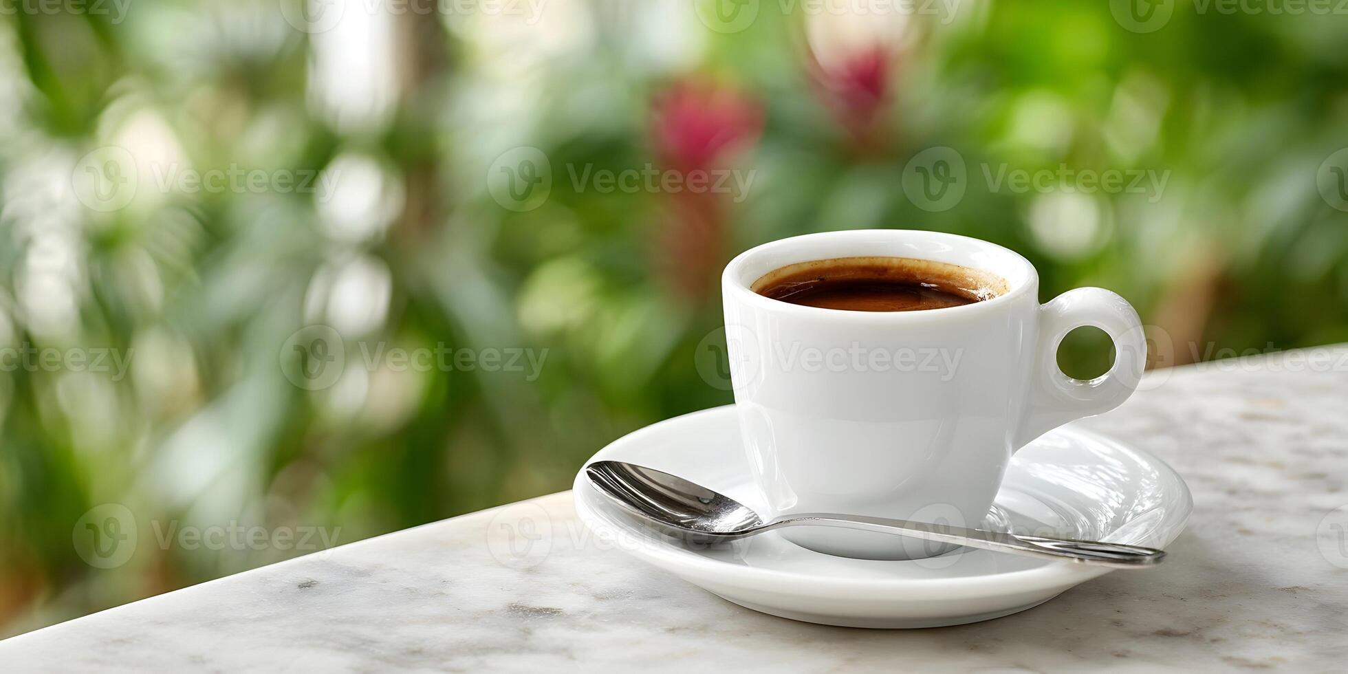 Espresso Coffee Cup on Marble Table Outdoor Setting Green Background photo