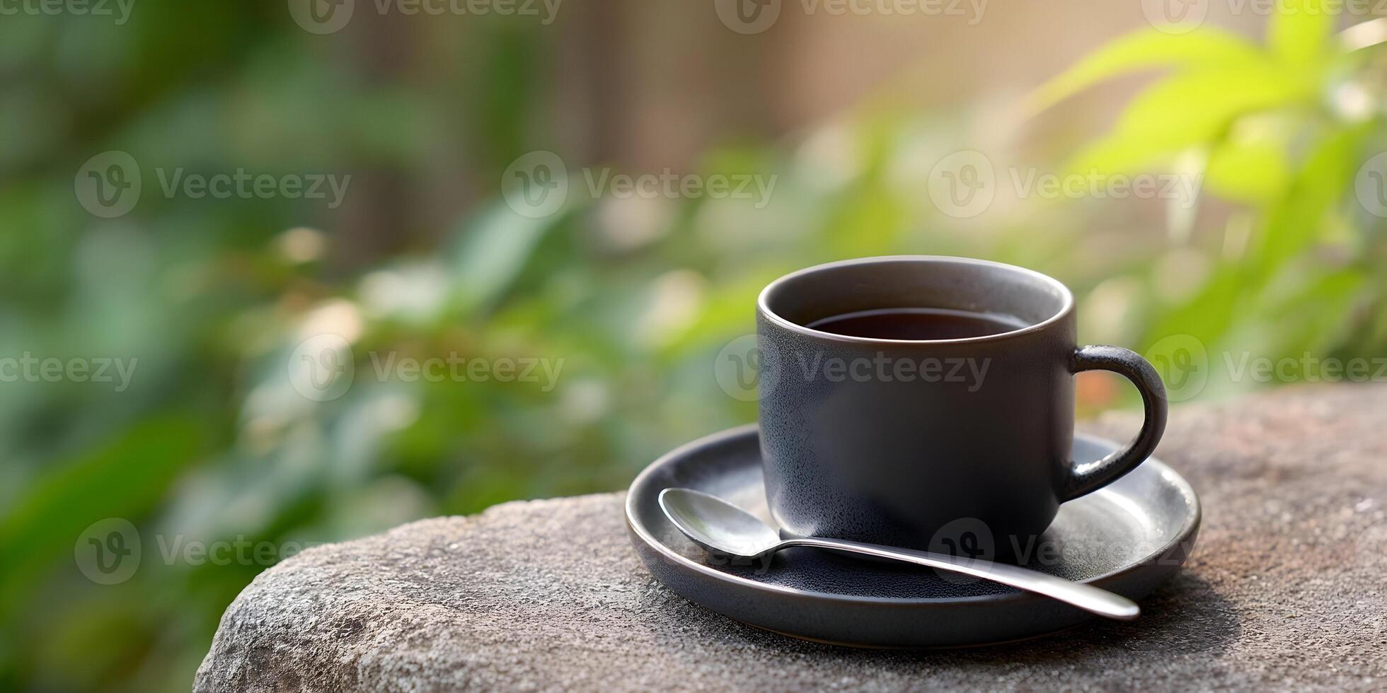 Dark Gray Coffee Cup Tea Mug on Stone Outdoors Nature Background photo