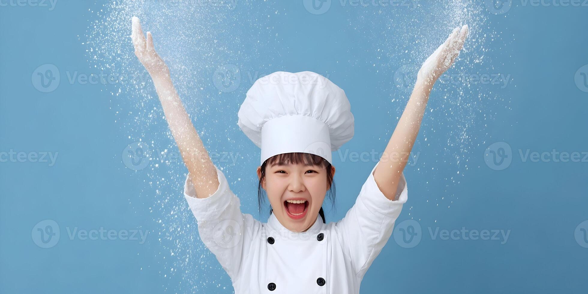 Happy Female Chef Throwing Flour Powder Up in Air Blue Background photo