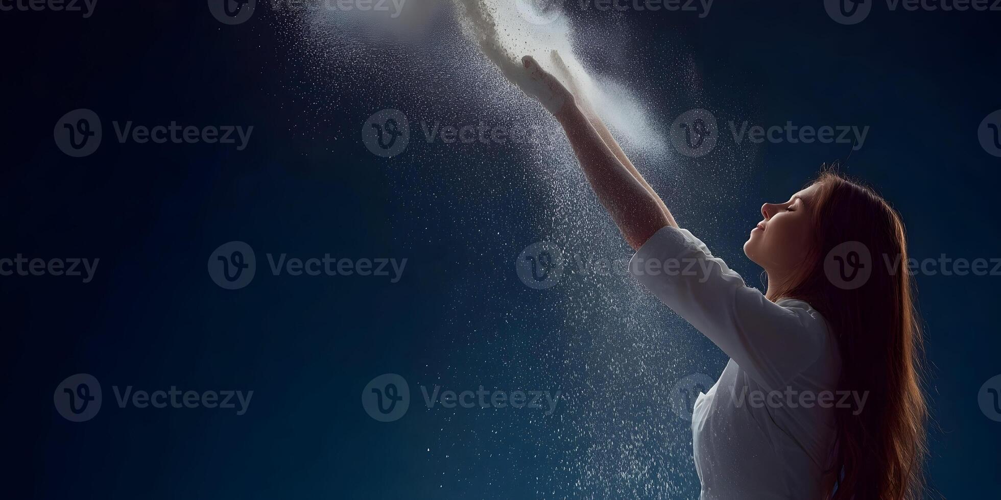 Woman in White Shirt Throwing Powder in Air Dark Background photo