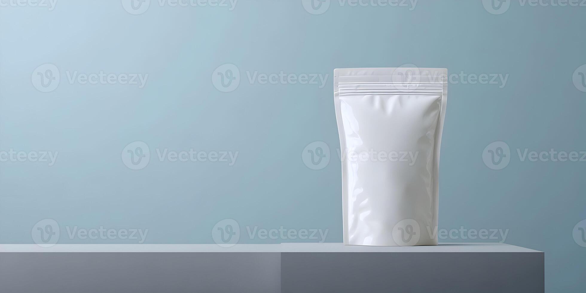 Blank White Stand Up Pouch Packaging Mockup on Gray Surface Light Blue Background photo