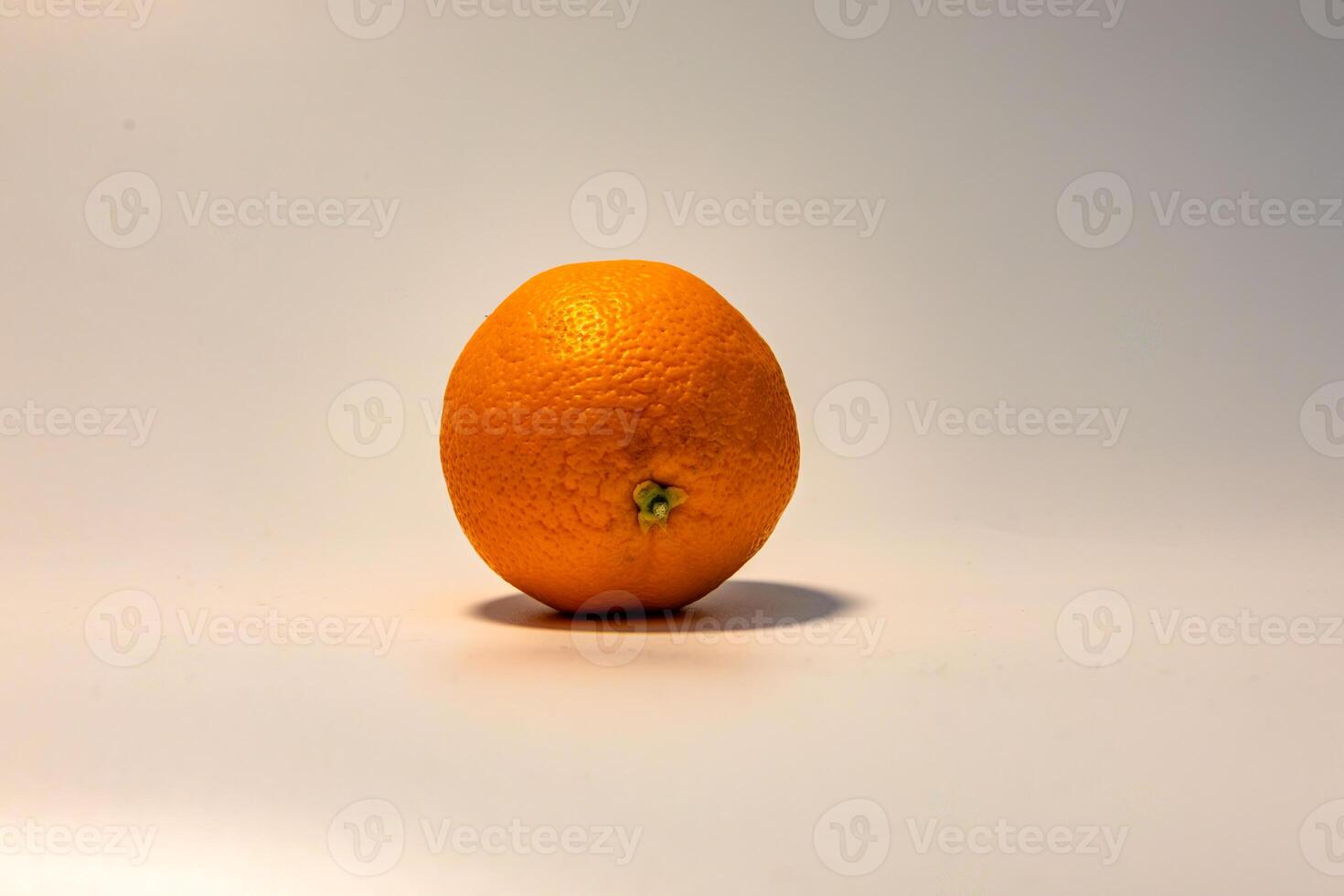 Vibrant Orange With Shadow Against Simple White Background photo