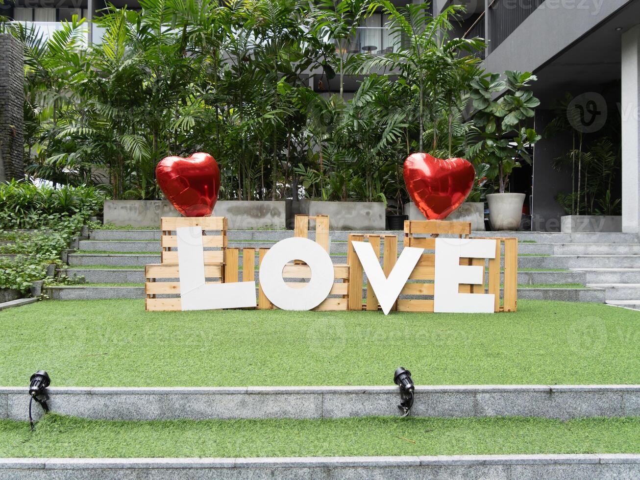Celebration of love heart decorations at outdoor venue romantic event urban oasis photo