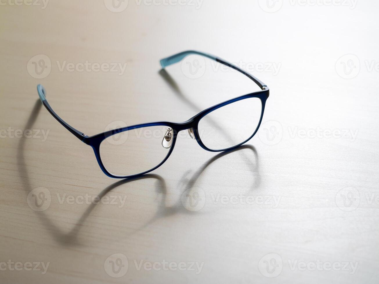 Stylish eyeglasses in a modern home office close-up product photography photo