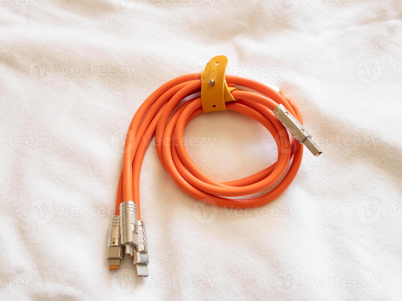 Connecting tools orange cable for technology projects home office setup photo