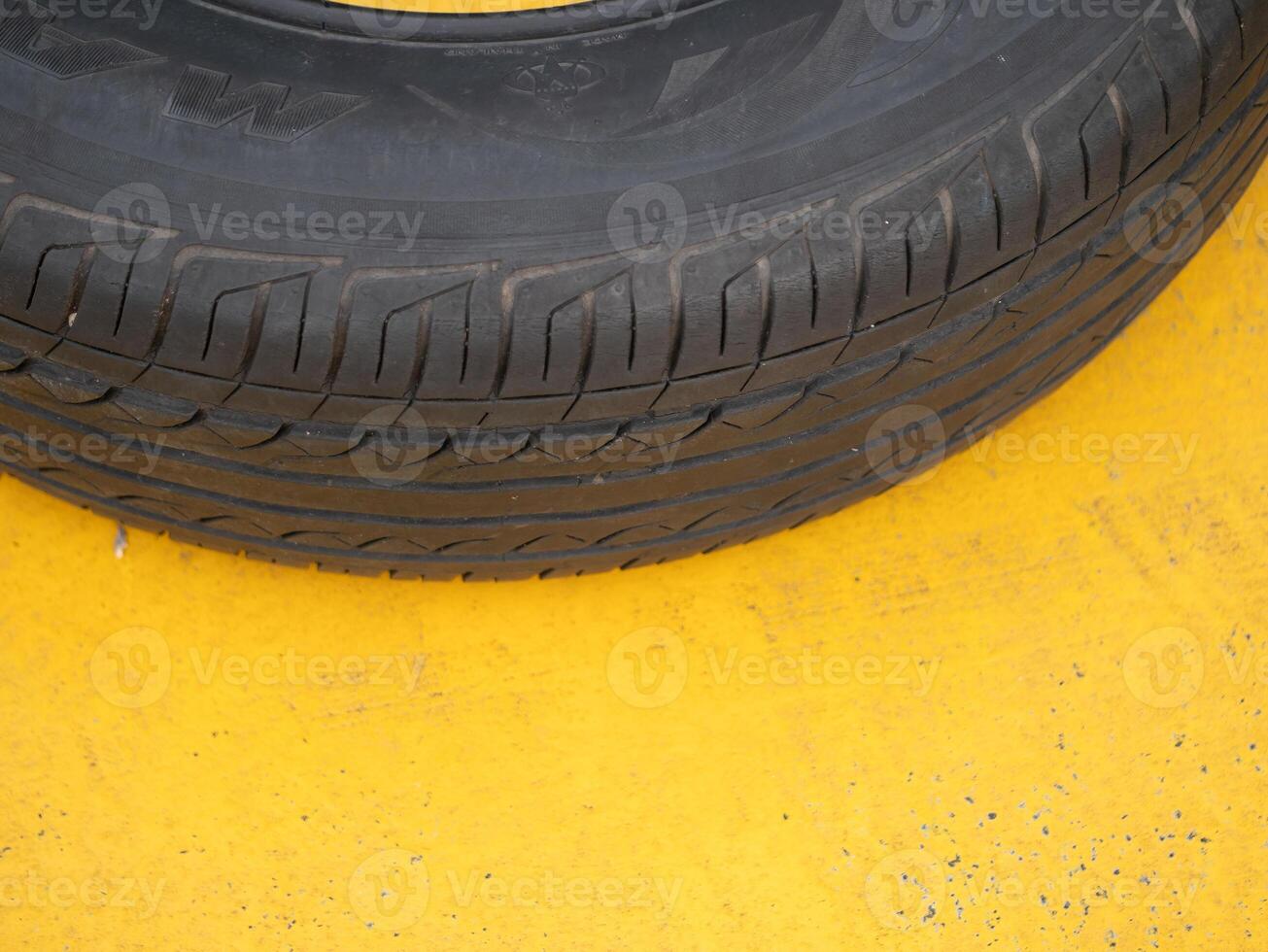 Tire close-up urban workshop photography industrial setting ground level mechanical concept for creative minds photo