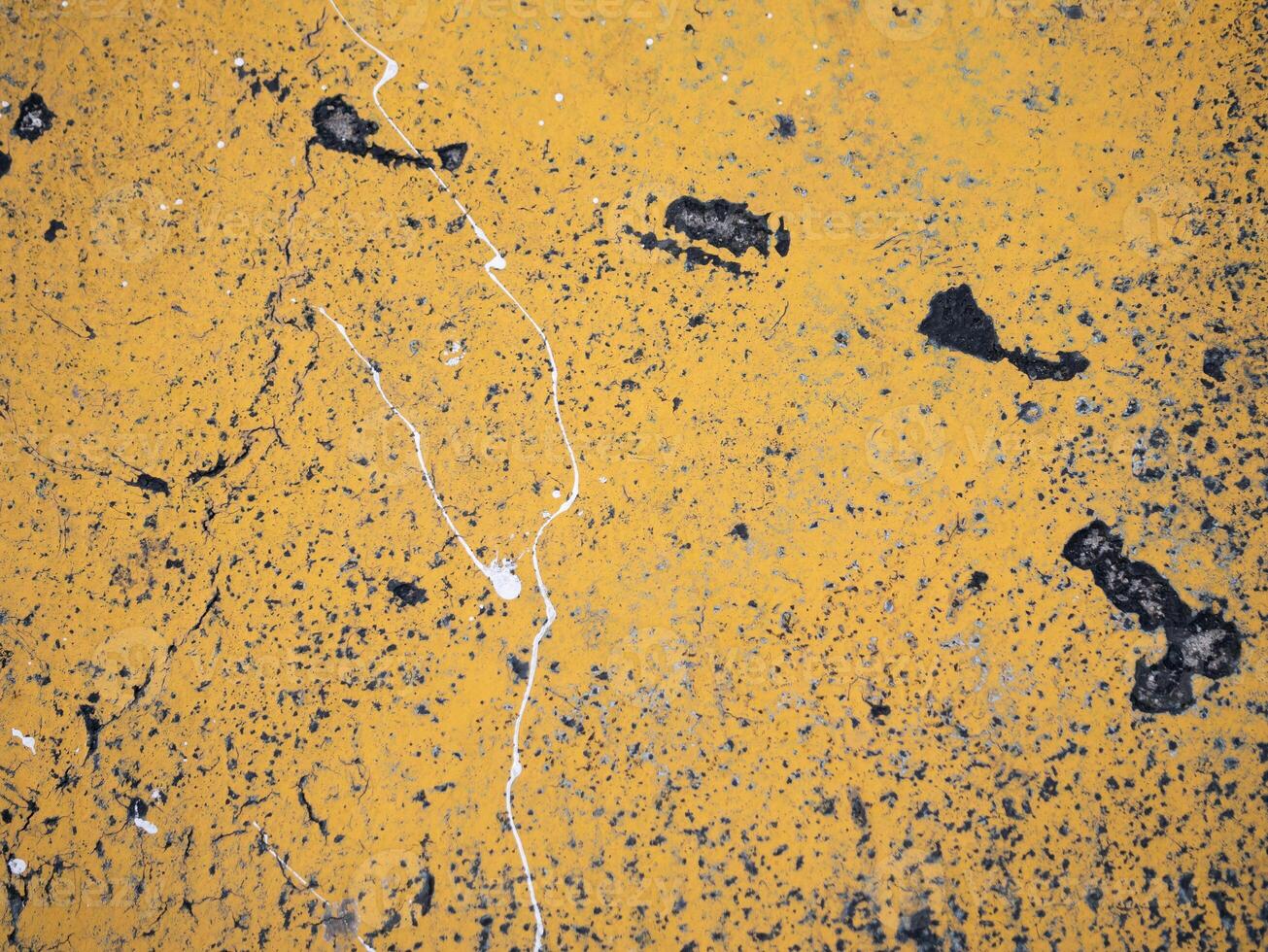 Abstract yellow textured surface urban setting photography visual art close-up inspiration for creativity photo