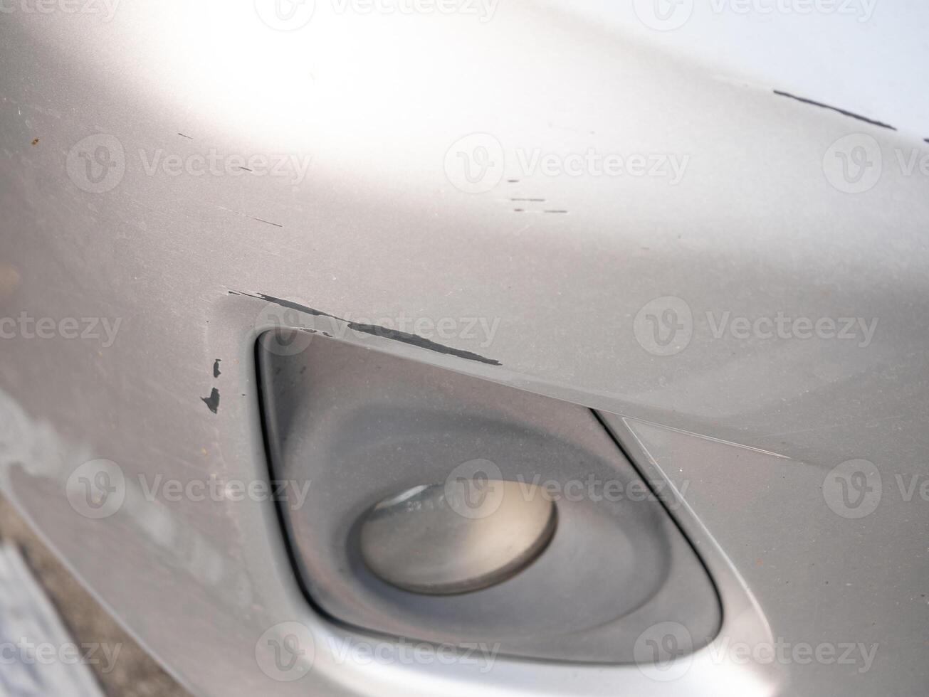 Car damage repair tips auto body shop tutorial urban setting close-up view vehicle maintenance and care photo