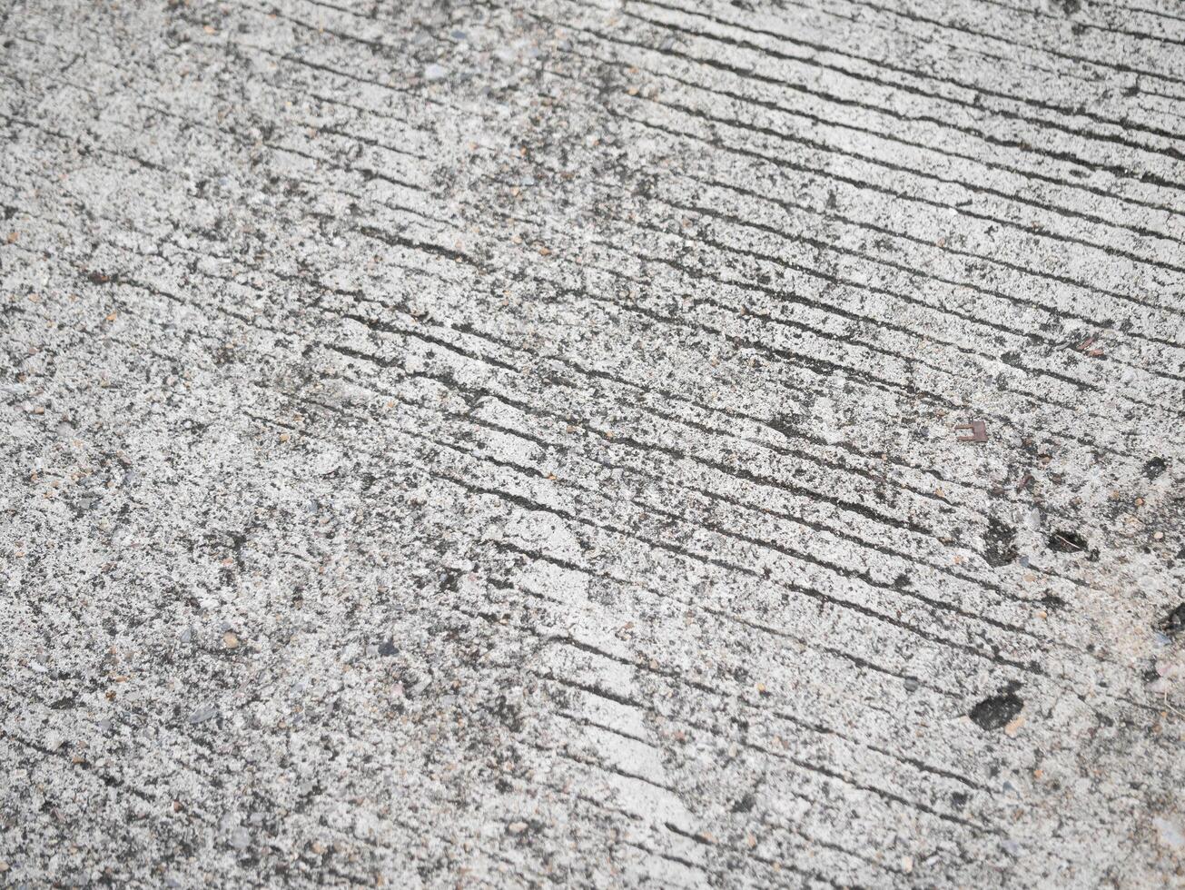 Detailed close-up of textured concrete surface urban environment abstract photography industrial setting minimalist perspective design aesthetic photo