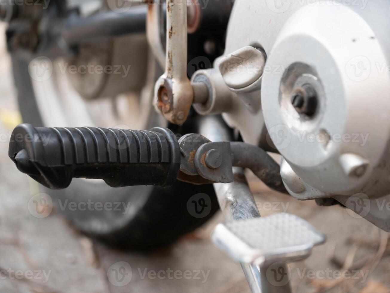Motorcycle maintenance tips exploring essential components garage instructional guide mechanical environment close-up view motorcycling basics photo