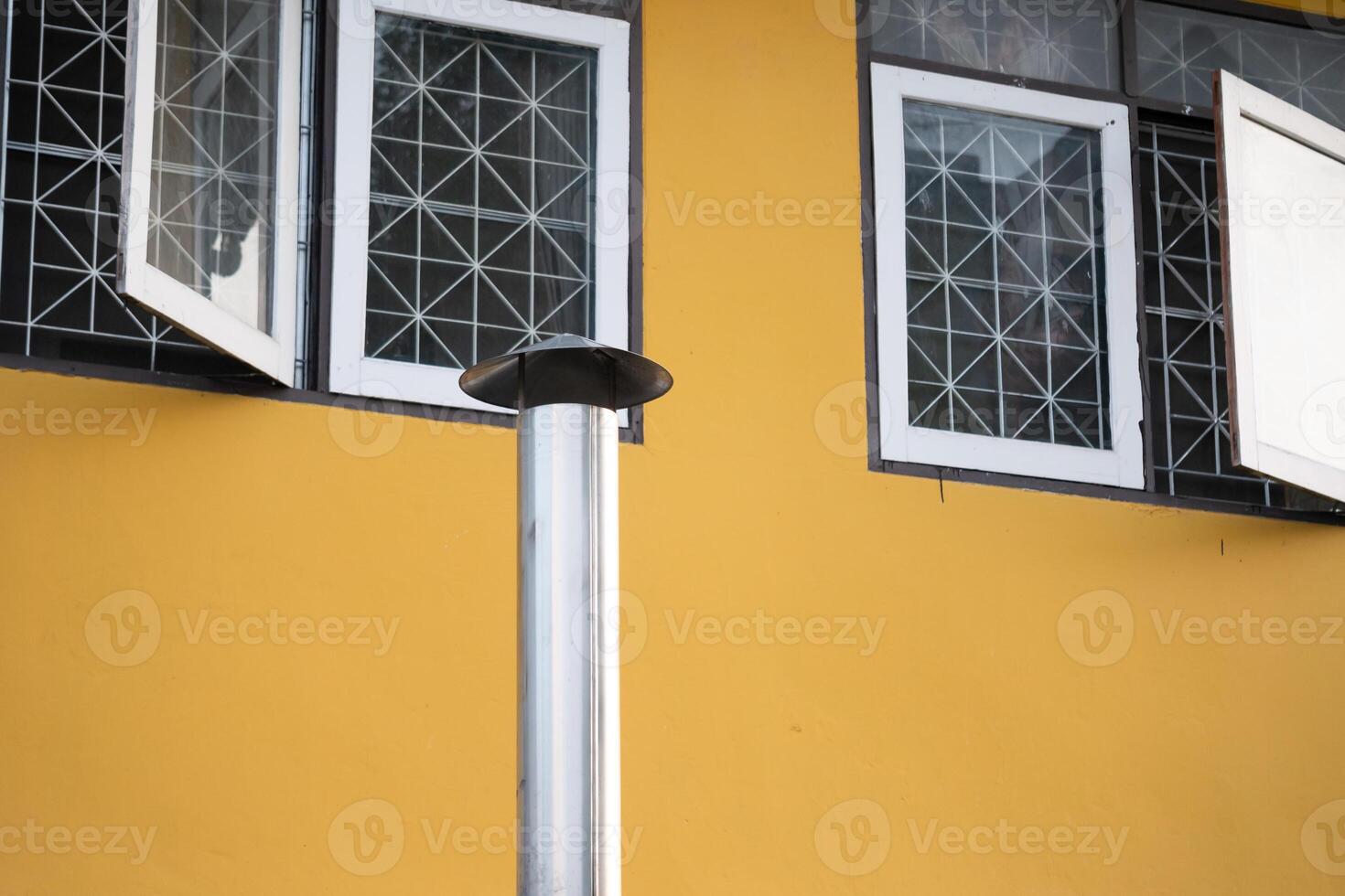 Smoke stack emission action urban setting industrial environment building view pollution concept photo