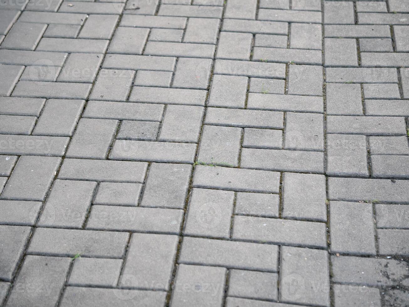 Urban paving design textured concrete patterns city streets architectural detail urban environment ground perspective modern aesthetics photo