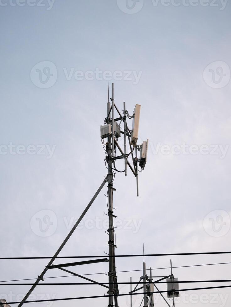 Telecommunication tower installation urban area infrastructure development clear sky elevated view modern connectivity solutions photo