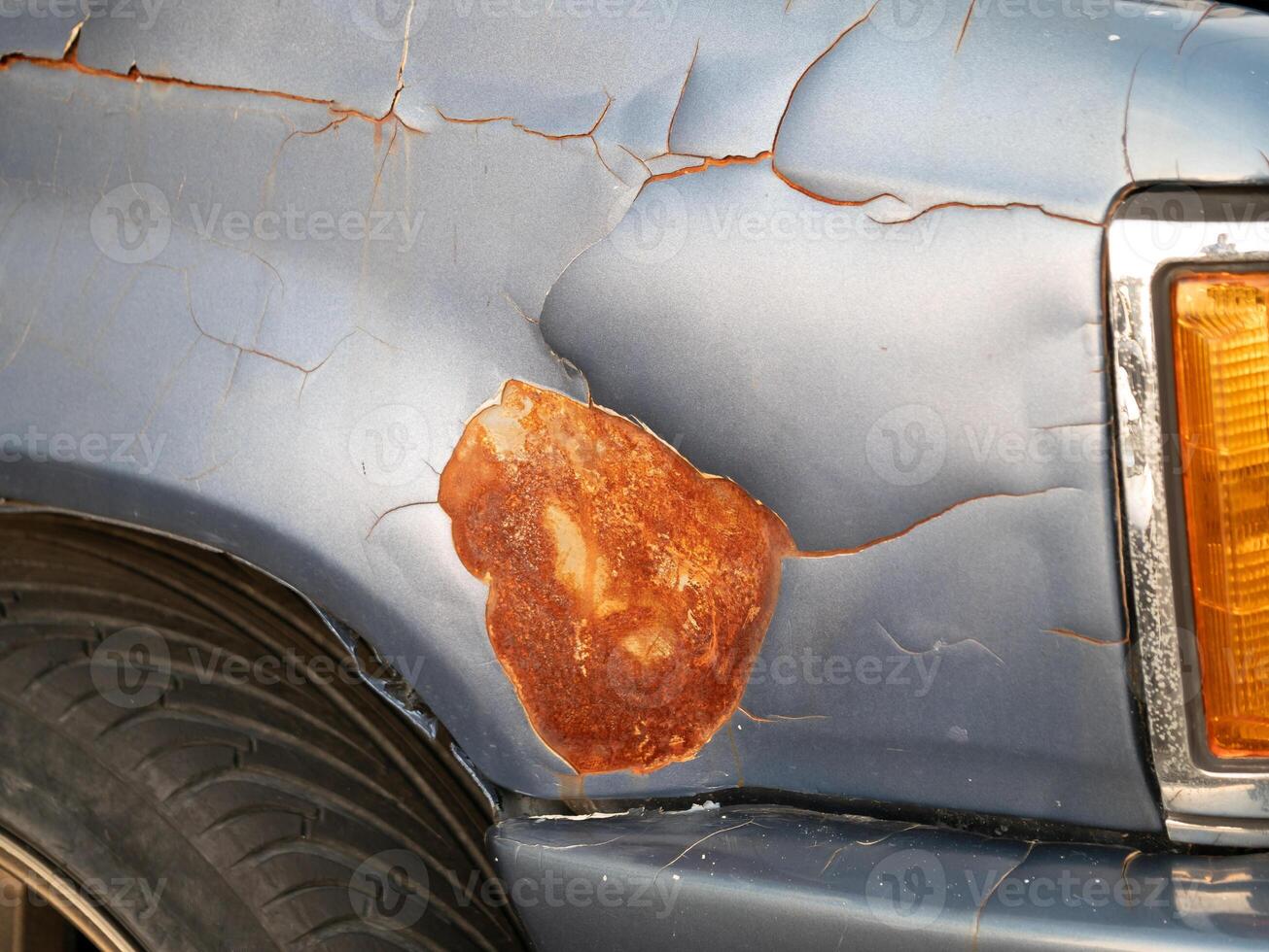 Rusty car surface damage urban environment automotive photography close-up view vehicle maintenance concept for seo impact photo
