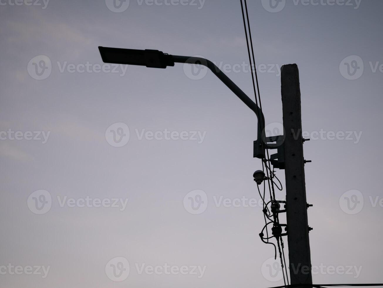 Streetlight installation urban area infrastructure evening low angle smart city development photo