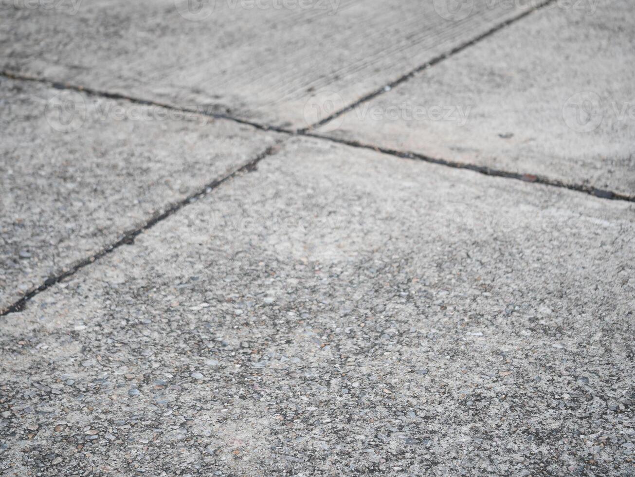 Concrete surface patterns urban environment high-resolution image outdoor setting ground level textural details for visual appeal photo
