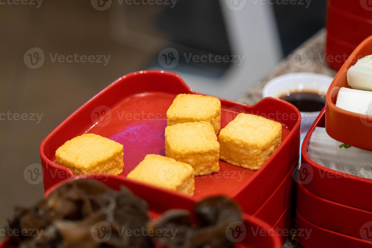 Delicious asian cuisine tasty tofu dishes at a food market culinary experience indoor setting close-up flavorful delights photo