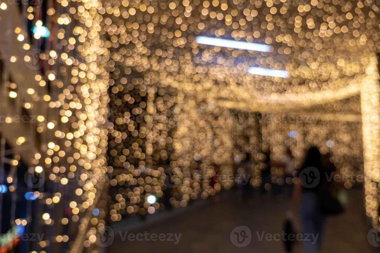 Twinkling lights create enchanting atmosphere urban walkway photography evening setting dreamy view holiday spirit photo