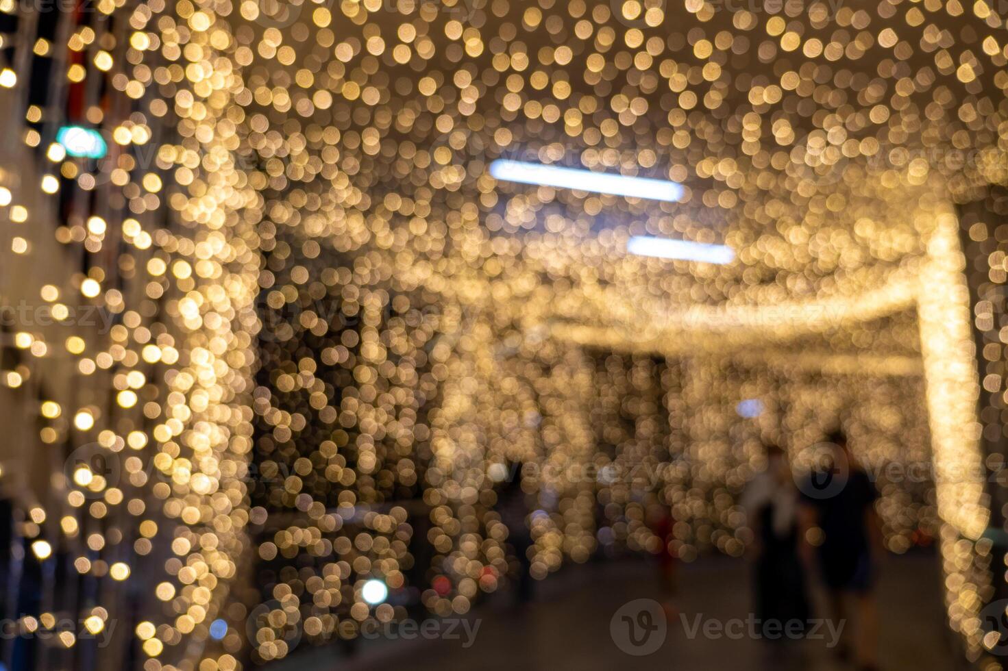 Festive lighting display urban shopping center decorative installation nighttime ambiance close-up view holiday spirit photo