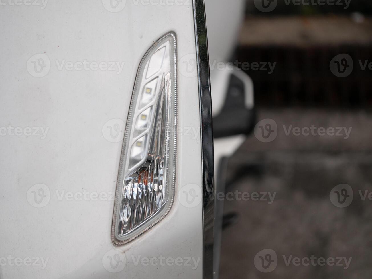 Vehicle detail close-up automotive scene image capture urban environment focused view technology insights photo