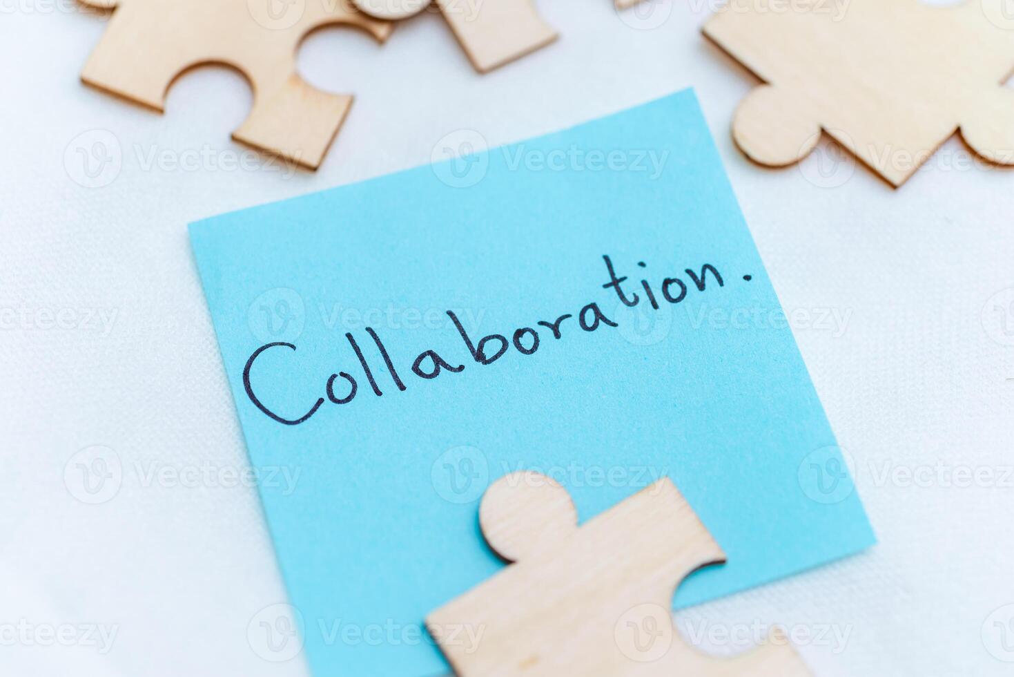 Collaboration in business strategies creative workspace close-up view teamwork concepts blue note emphasizing team spirit photo