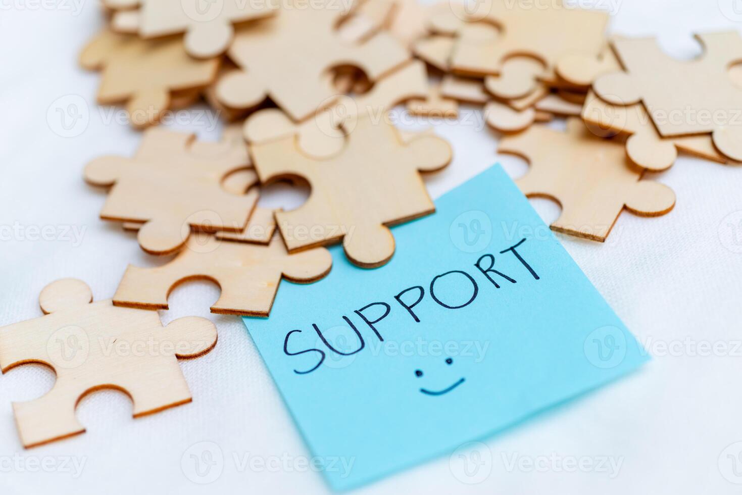 Business support strategies office environment puzzle pieces positive mindset collaborative approach for team success photo