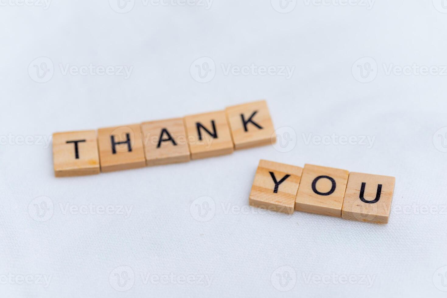 Thank you message business context wooden blocks minimalist setup close perspective appreciation concept for enhanced engagement photo