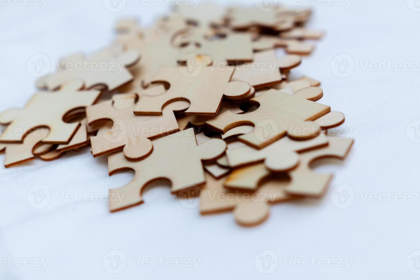 Puzzle pieces for business strategy development office space visual content creative environment close-up problem-solving concept photo