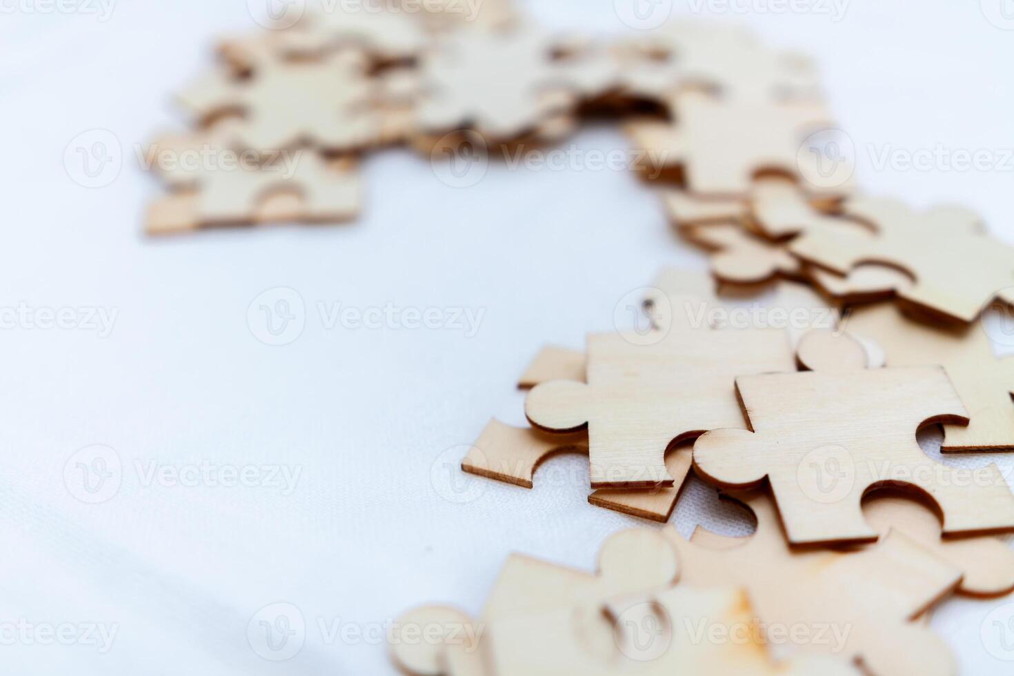 Strategic business puzzle solving session office team collaboration professional environment close-up view problem-solving concept photo