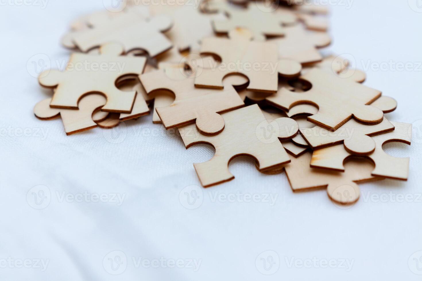 Creative business solutions puzzle assembly collaborative office space engaging team environment focus on problem solving photo