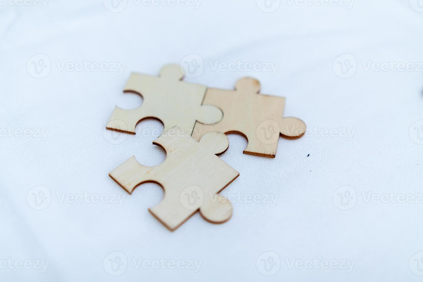 Business strategy puzzle pieces office workspace conceptual image creative environment close-up view collaboration ideas for success photo