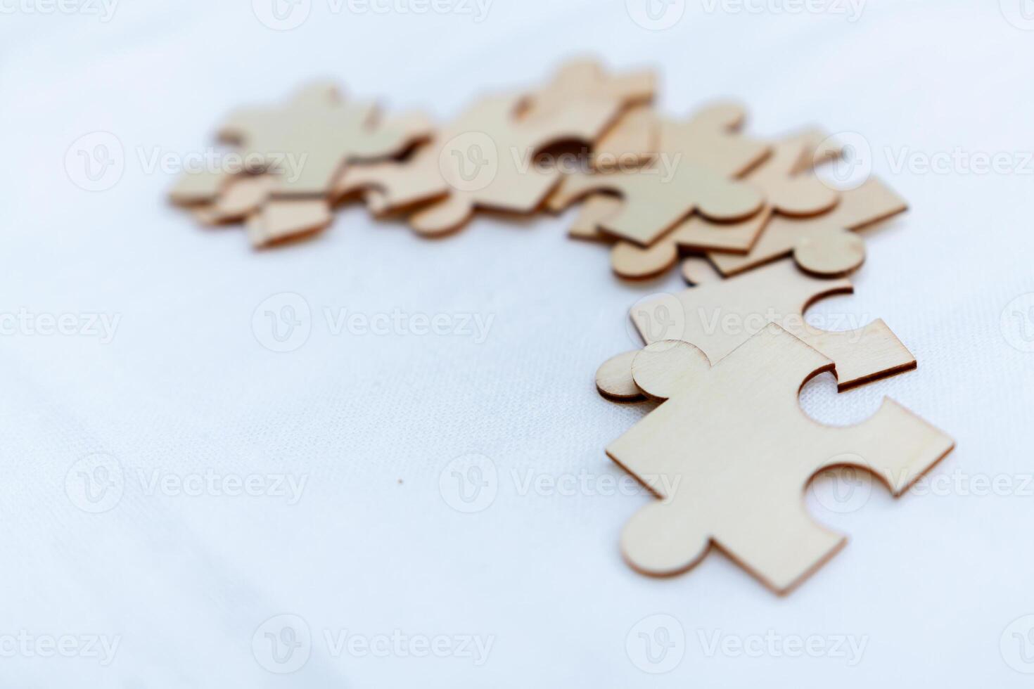 Engaging business strategy puzzle pieces office setting creative content collaborative environment close-up view conceptual insight photo