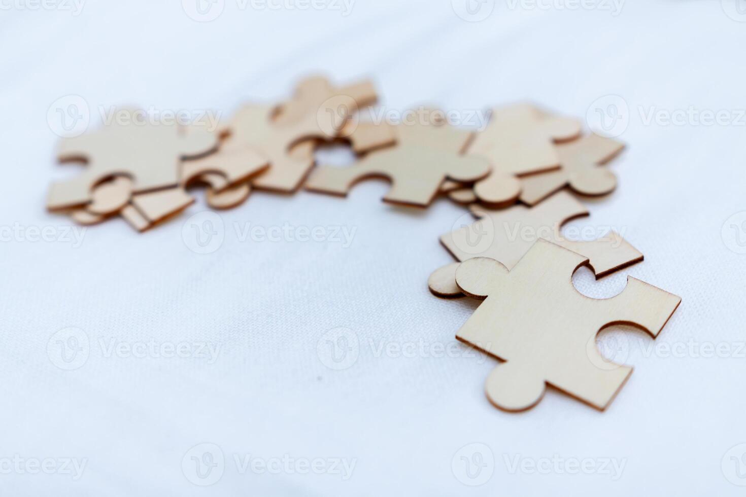 Puzzle pieces symbolizing business strategy creative workspace visual content minimalist environment close-up perspective conceptual thinking photo