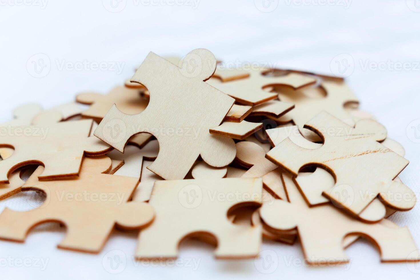 Puzzle completion event at a business workshop indoor environment with creative elements engaging viewpoint on team dynamics photo