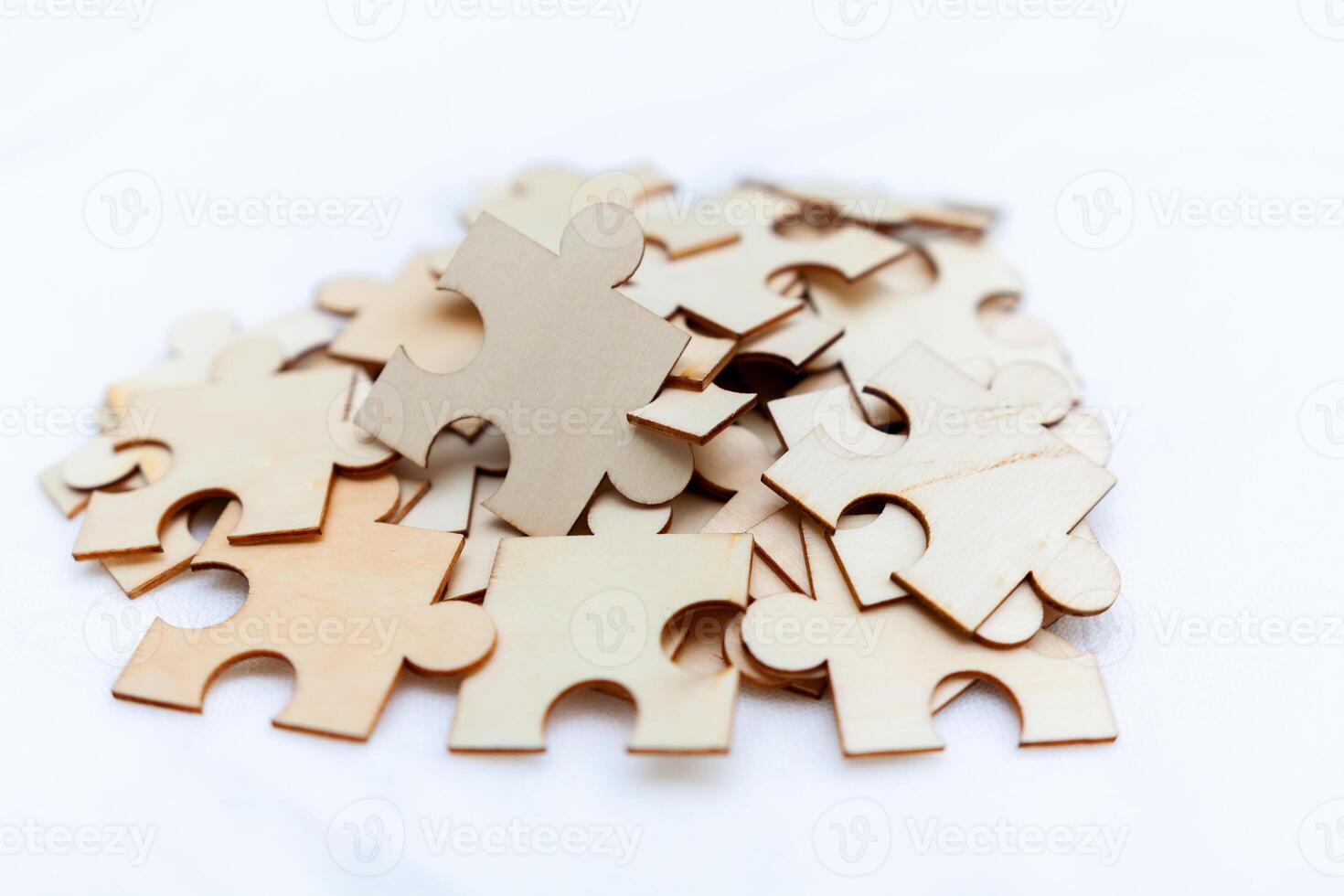 Strategizing business solutions puzzle assembly event office space visual representation creative collaboration problem-solving concept photo