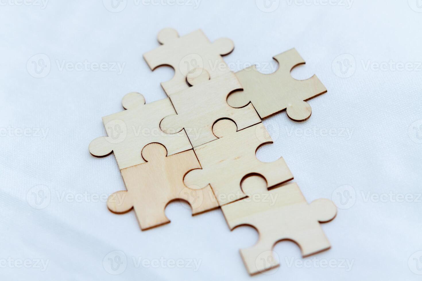 Strategic business planning office workspace puzzle pieces collaborative environment close-up problem-solving concept photo