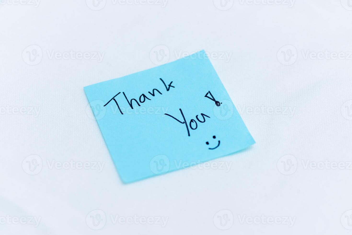 Gratitude in the workplace thank you note office desk message type professional environment close-up view business appreciation photo