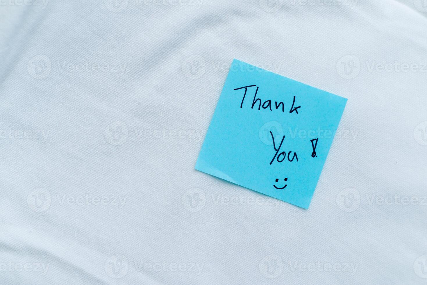 Gratitude in business thank you note on white fabric close-up inspirational calm environment personal touch photo