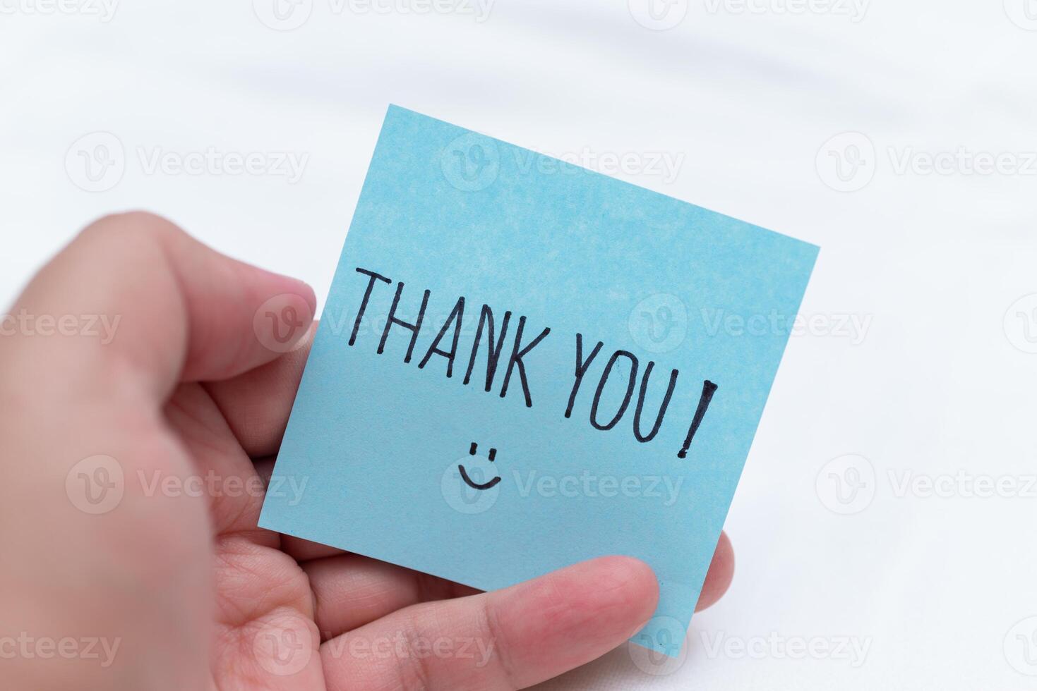 Gratitude gesture in a business context thank you note office setting visual content professional environment close-up perspective business concept photo