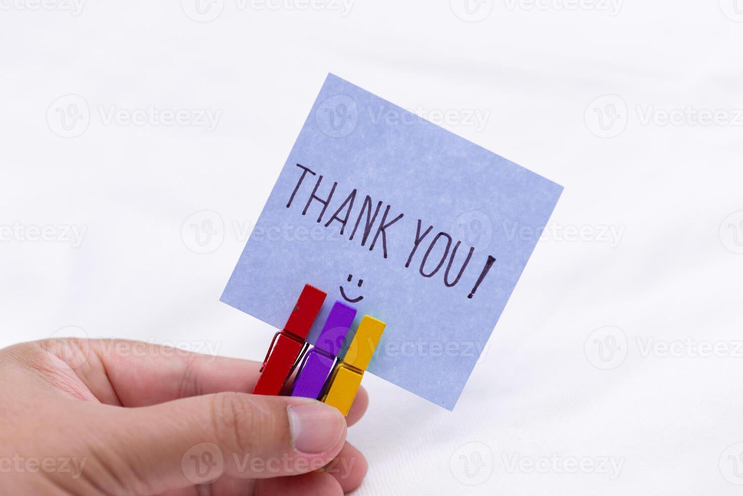 Thank you note in hand business appreciation gesture indoor setting personal touch close-up view gratitude concept photo