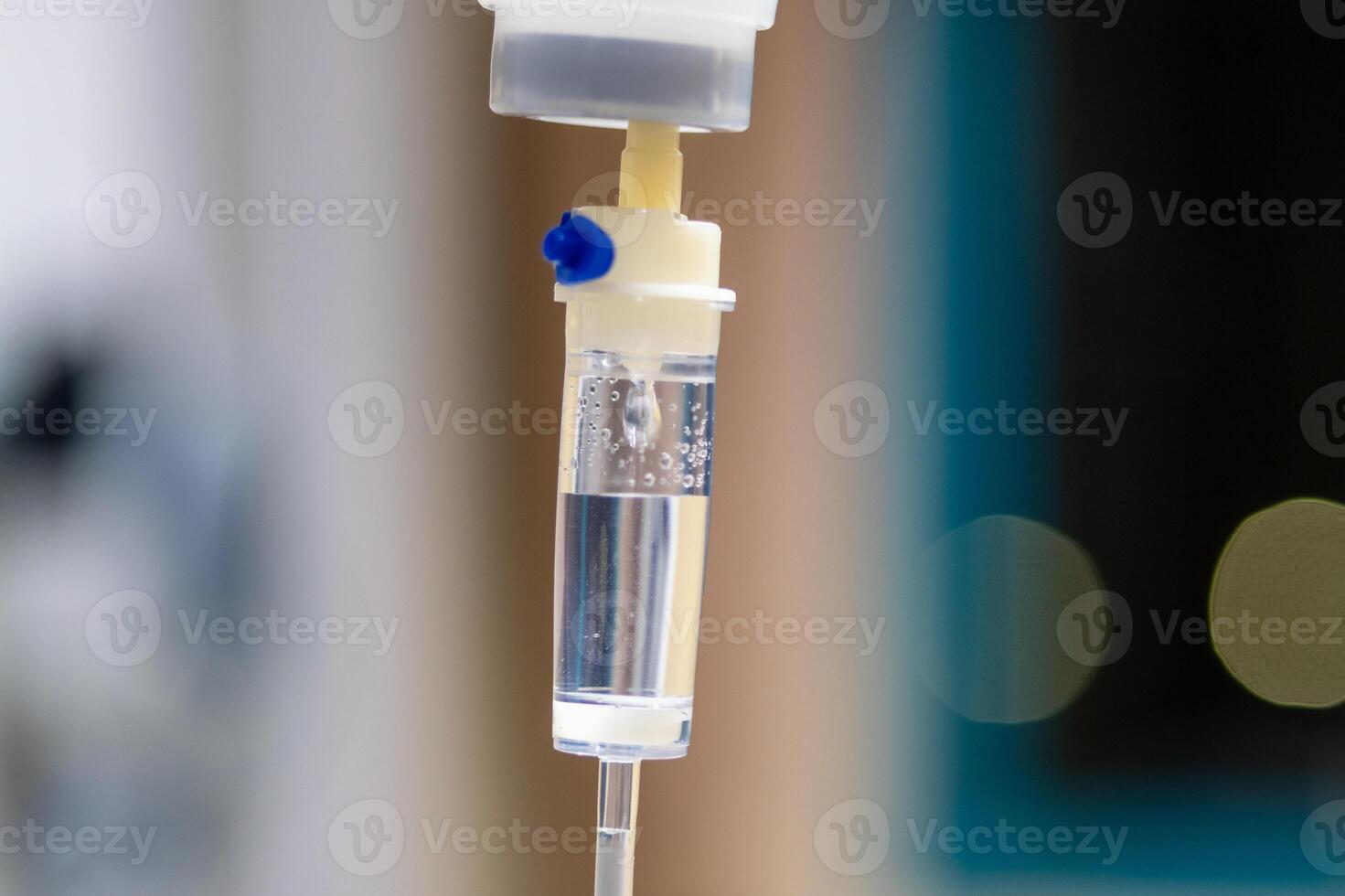 Healthcare action iv fluid administration in hospital setting with clinical focus photo