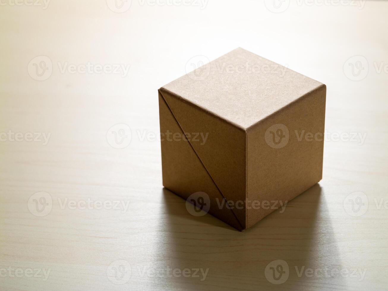 Unpacking creativity cardboard box on wooden table minimalist setting still life photo